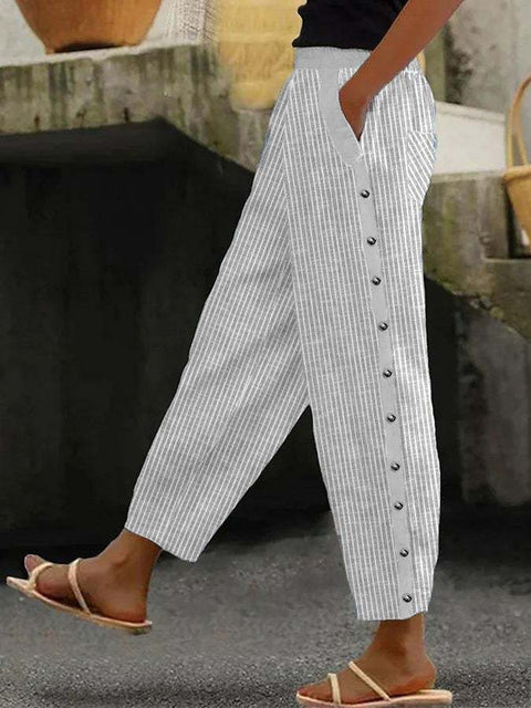 Fashion new printed striped button-up rubber band waist nine-point pants m301458